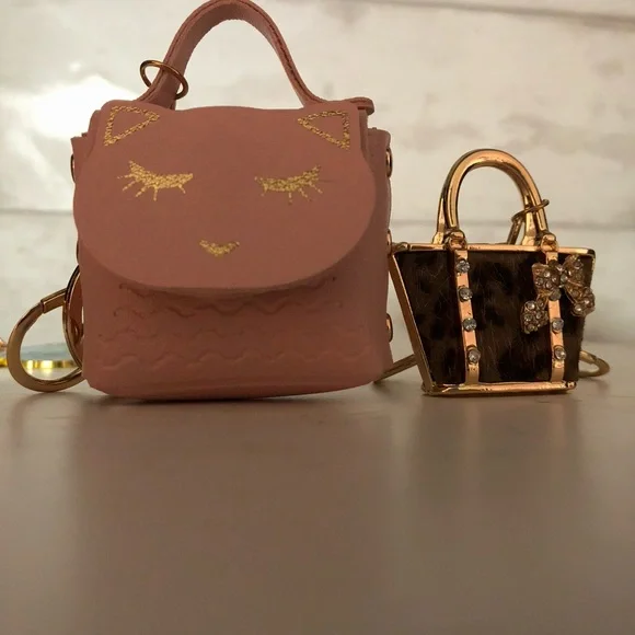 Group of four keychains or/and purse charms. - Picture 4 of 9